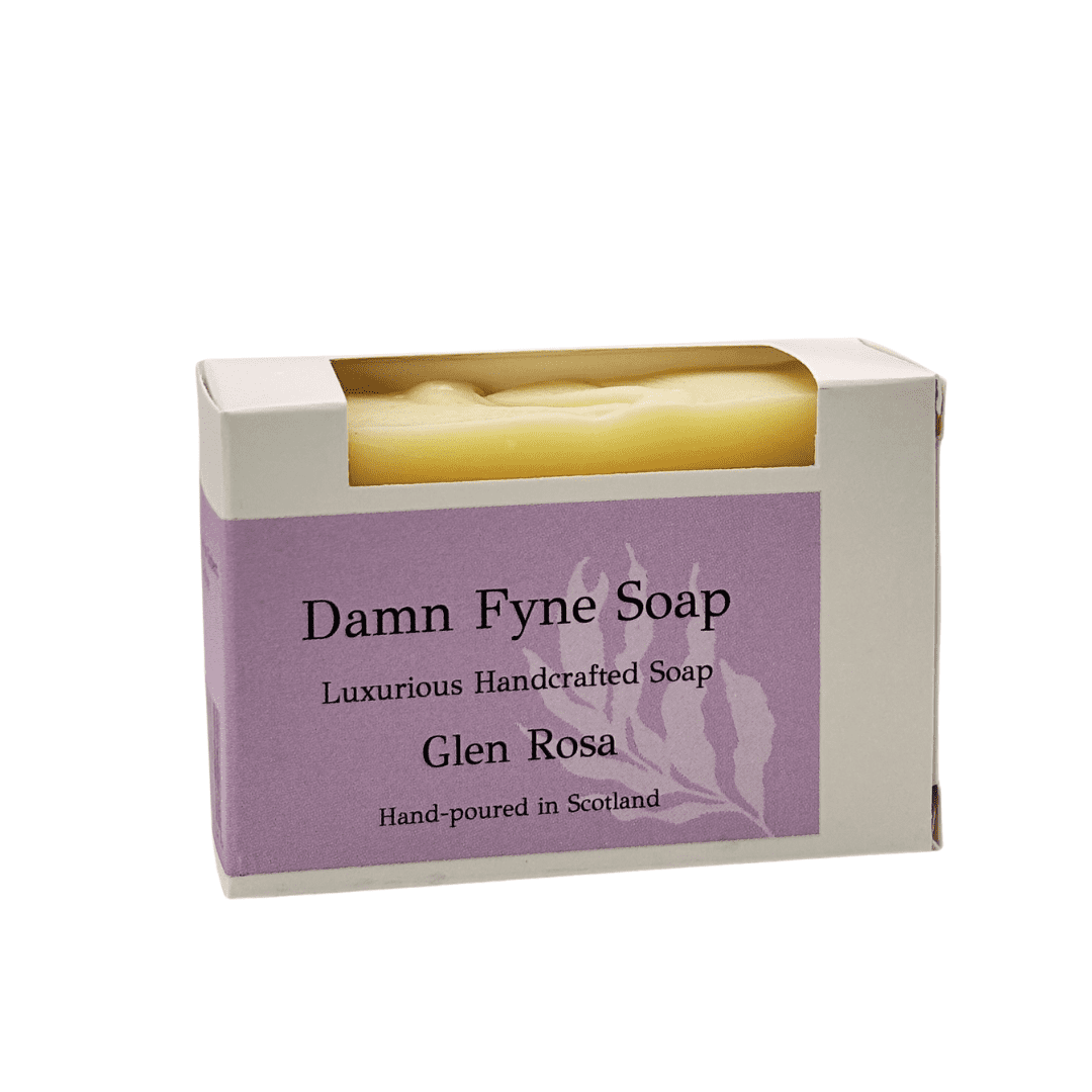 Glen Rosa handmade soap bar in biodegradable kraft packaging with a soft pink label. Label reads “Damn Fyne Soap – Luxurious Handcrafted Soap – Glen Rosa – Hand-poured in Scotland.” Pale-toned soap visible above the box, photographed on a neutral background.