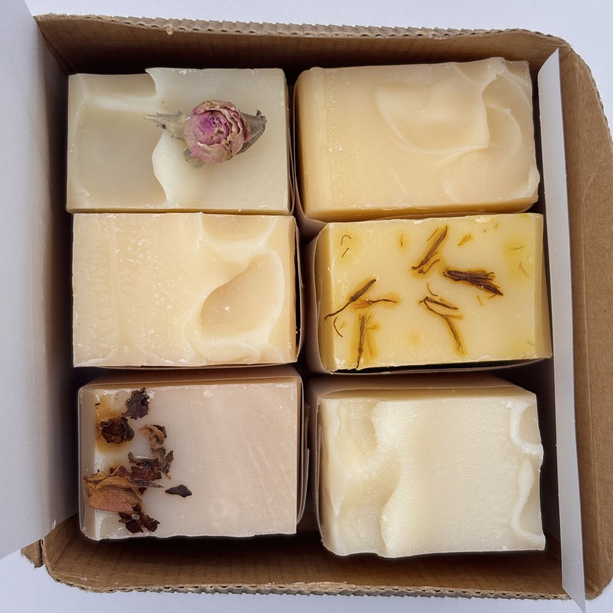 Six handmade soaps in kraft gift box including Signature and Triple Butter soaps