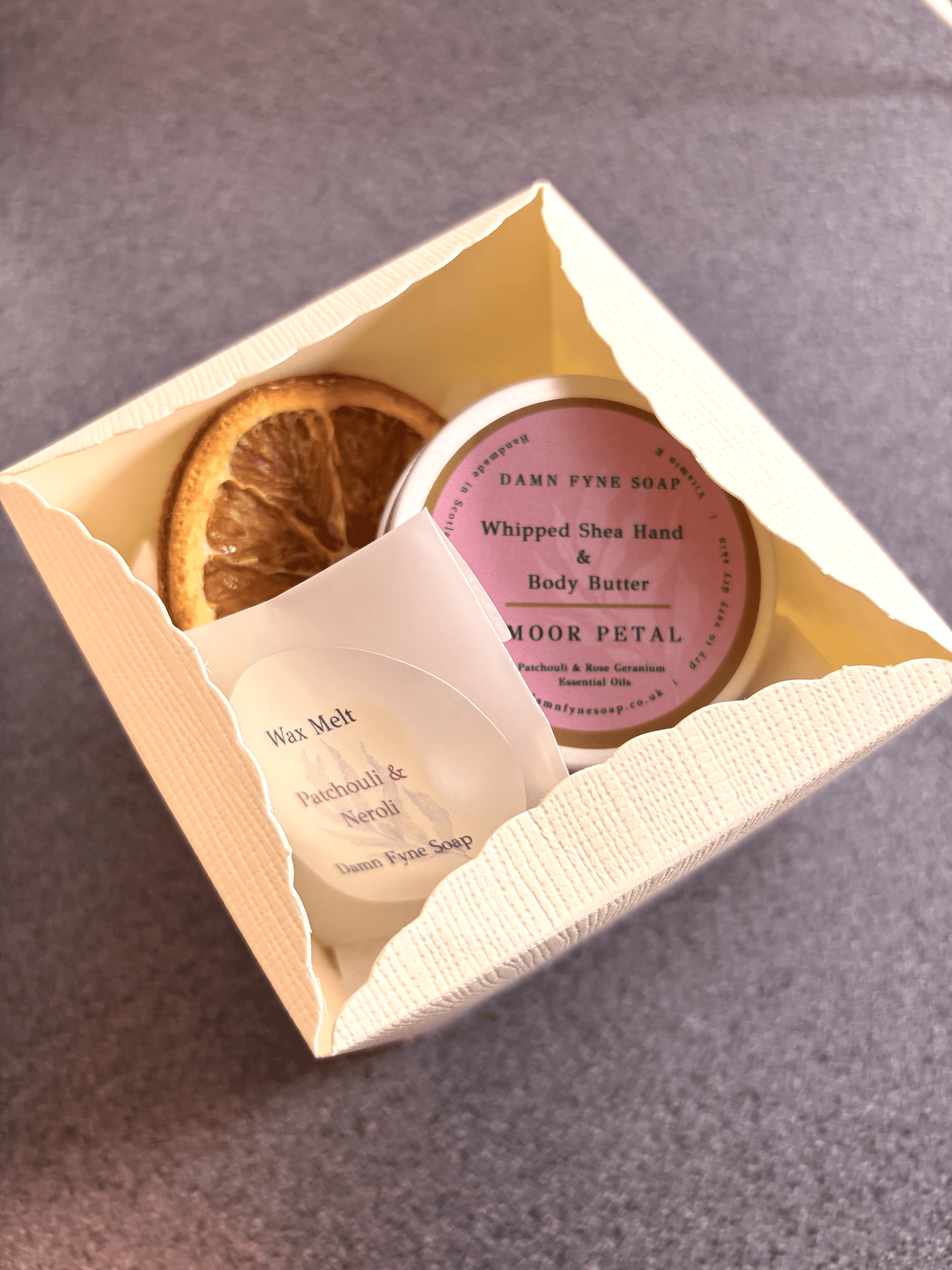 Gift set with body butter, wax melt, box with navy ribbon