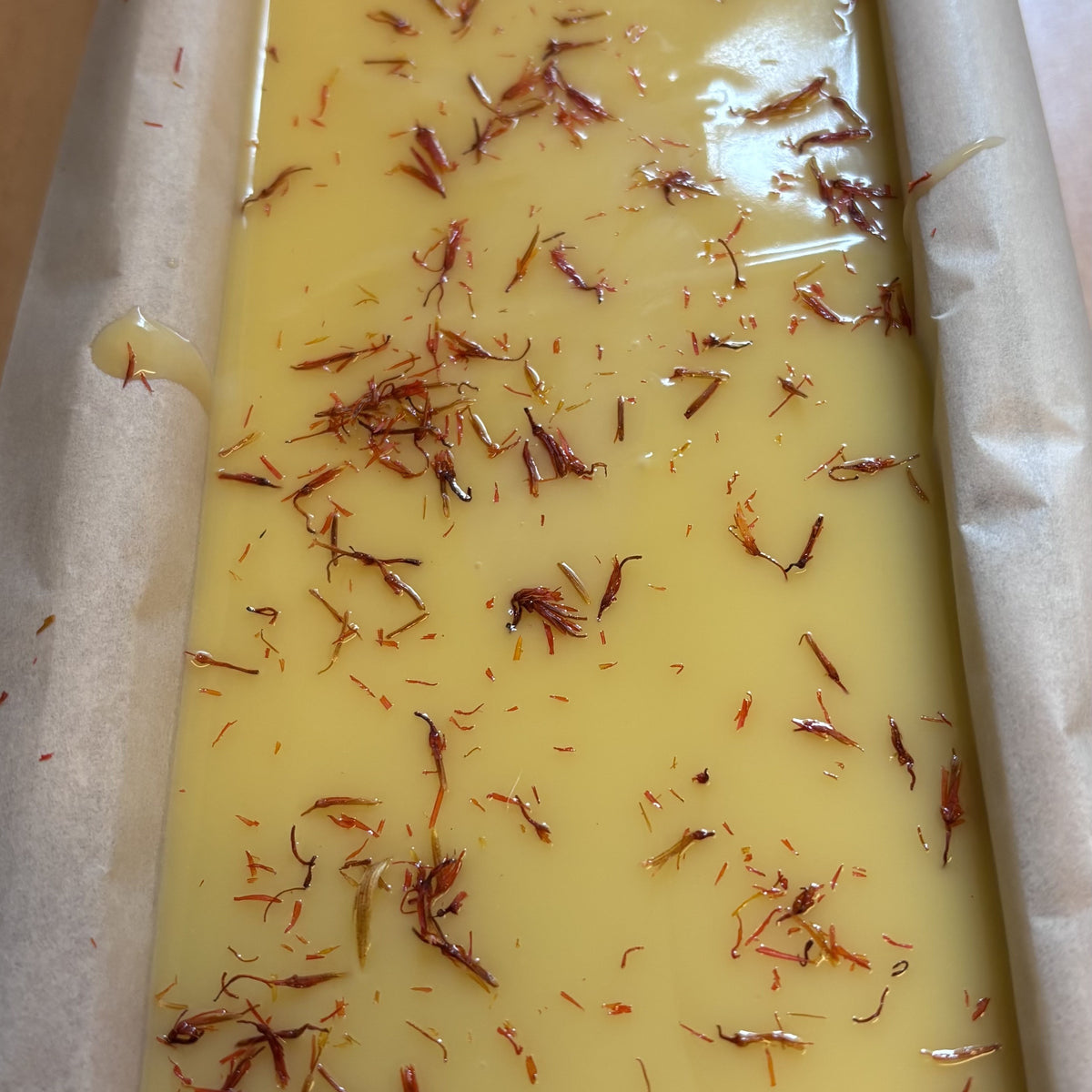 Freshly poured lavender and orange soap