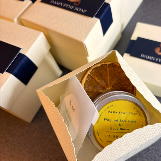 DAMN FYNE SOAP whipped shea body butter in a gift box with a patchouli wax melt