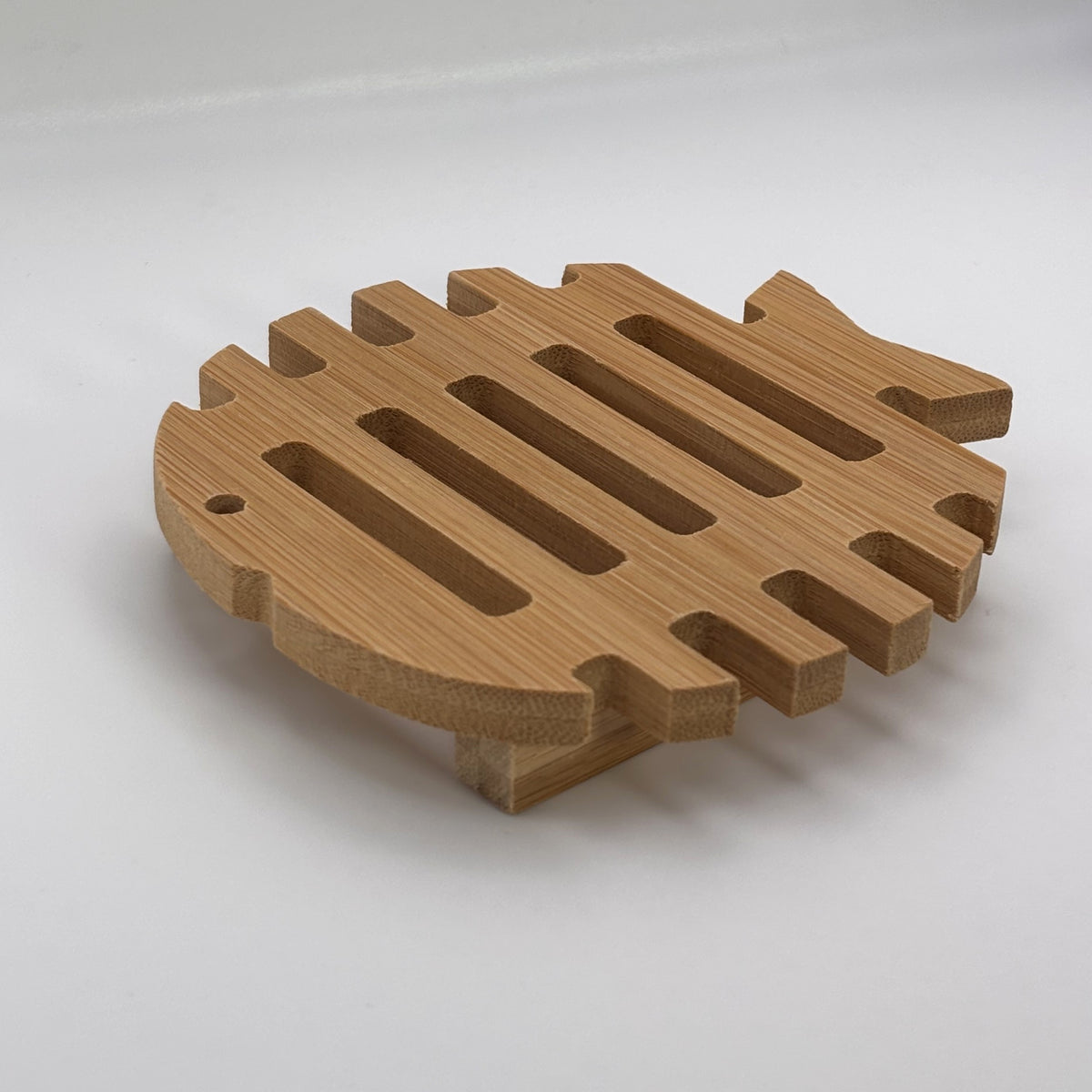 Round bamboo soap dish with drainage slots for handmade soap bars